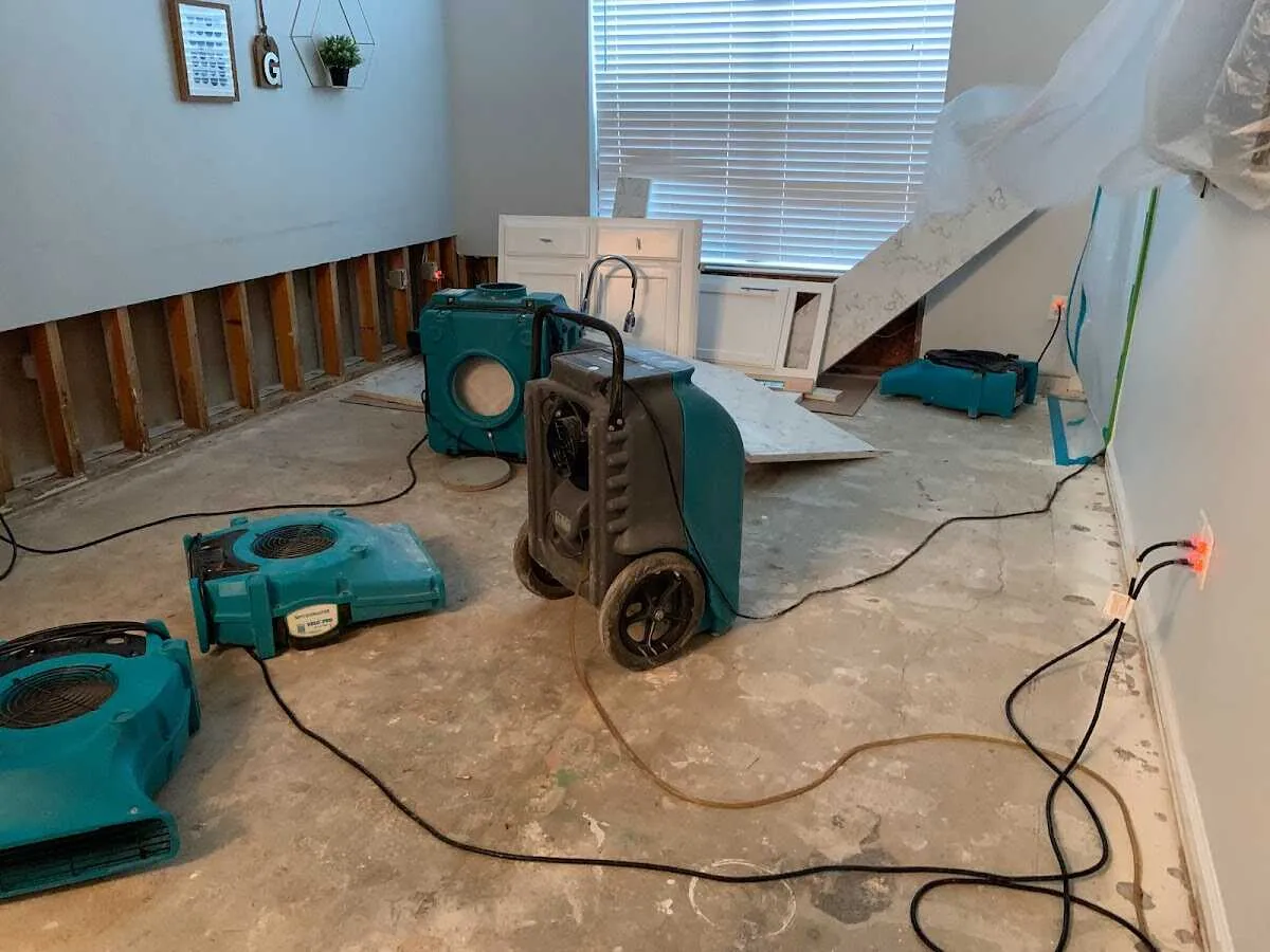 Dehumidifier in flood-cut room for Water Damage Restoration in Butte-Silver Bow